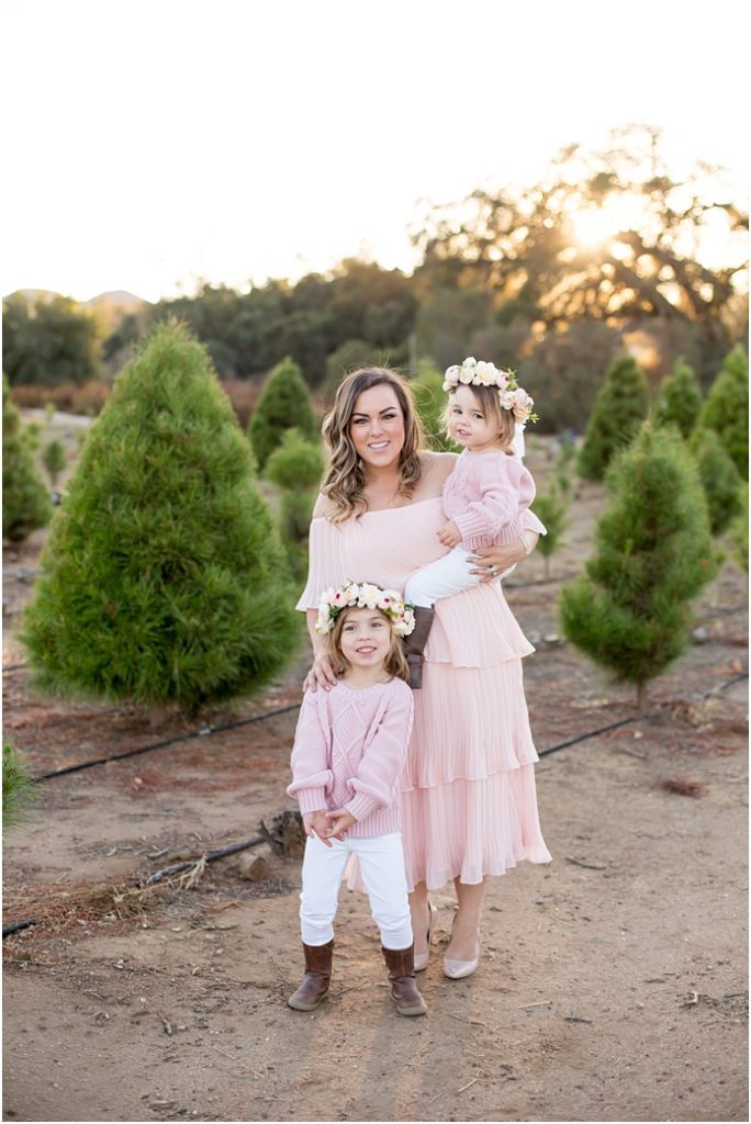 mom and girls at christmas tree farm