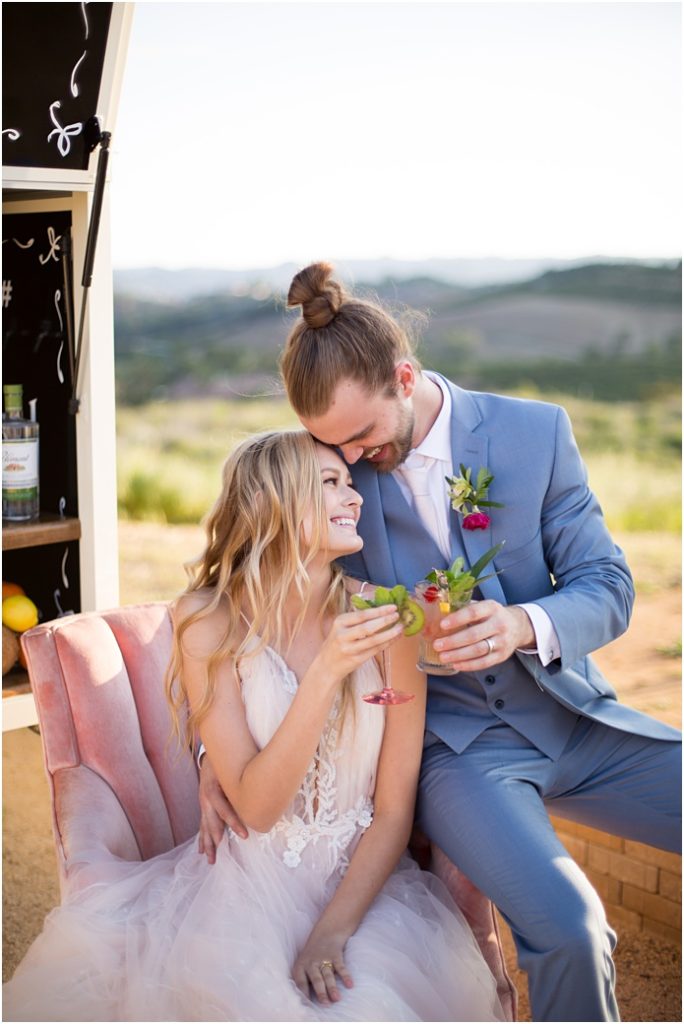 Emerald Peak bride and groom with drinks