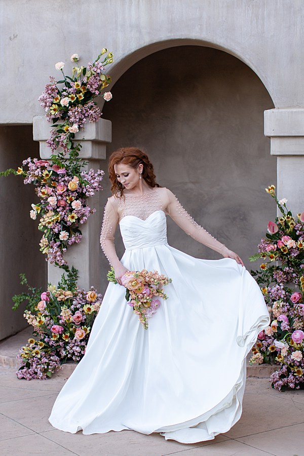 girl twirling in white wedding dress southern charm inspiration| AubreyRae