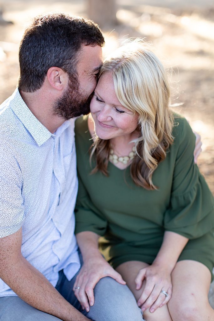 Skyes Ranch Park Murrieta | Aubrey Rae | couple sitting on log snuggled together