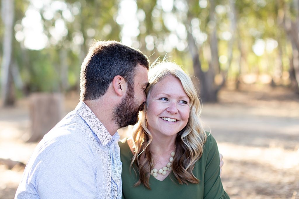 Skyes Ranch Park Murrieta | Aubrey Rae | couple sitting on log snuggled together