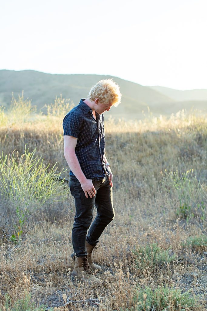 Skyes Ranch Park Murrieta | Aubrey Rae | senior boy standing in field 