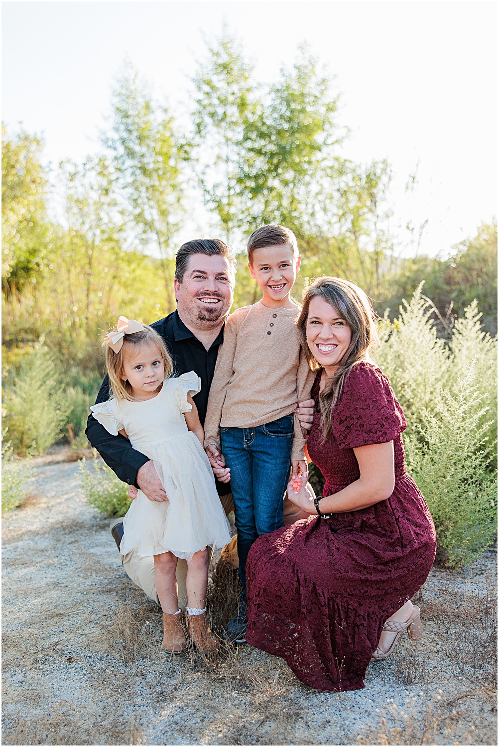 Menifee Family Photographer | Aubrey Rae | family of 4 posing together 