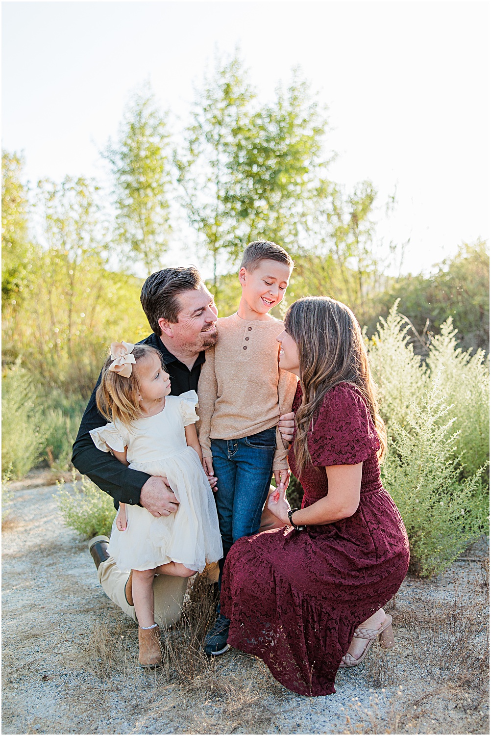 Menifee Family Photographer | Aubrey Rae | family of 4 posing together 