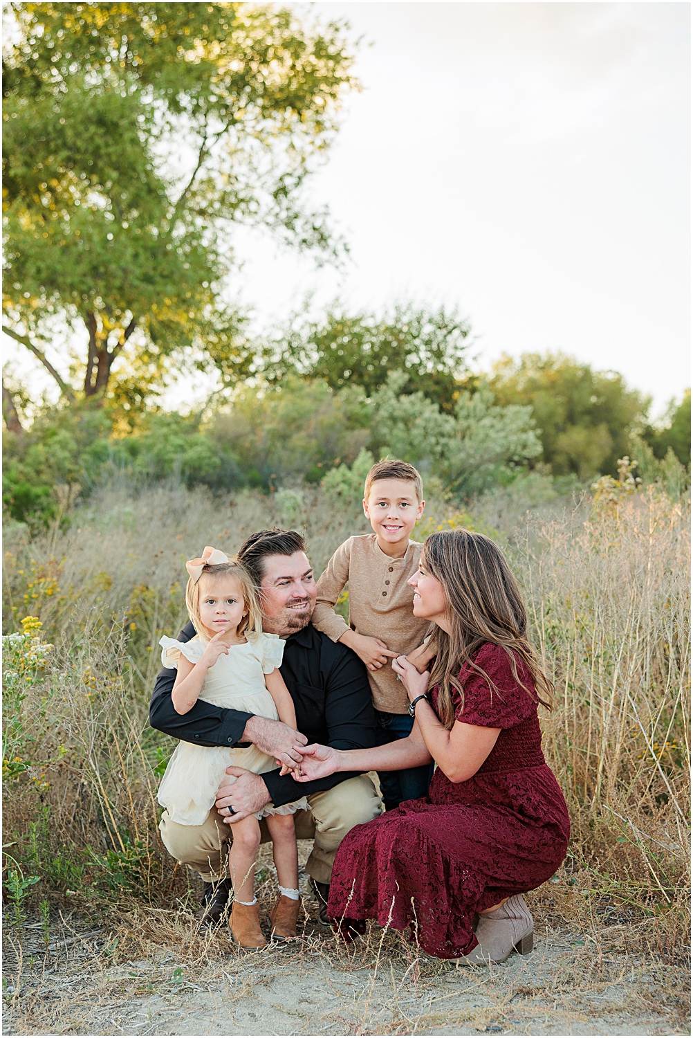 Menifee Family Photographer | Aubrey Rae | family of 4 posing together 