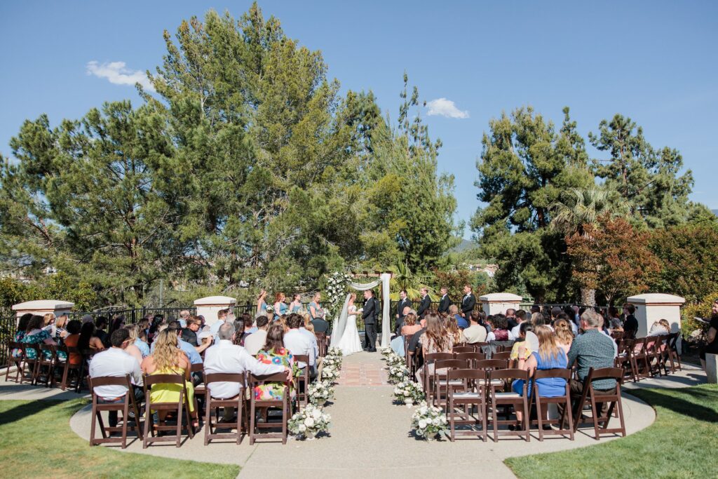 Hawk's Pointe wedding venue, ceremony site with guests